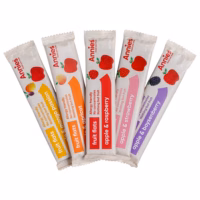 Five individual packets of Annie's fruit flats in various flavours including apricot, strawberry, boysenberry, raspberry, and mango passion.