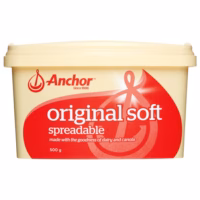 Container of Anchor Original Soft Spreadable Butter with a red and cream design, 500g size.