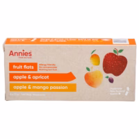 Box of Annies Fruit Flats containing apple and apricot snacks with allergy-friendly label.